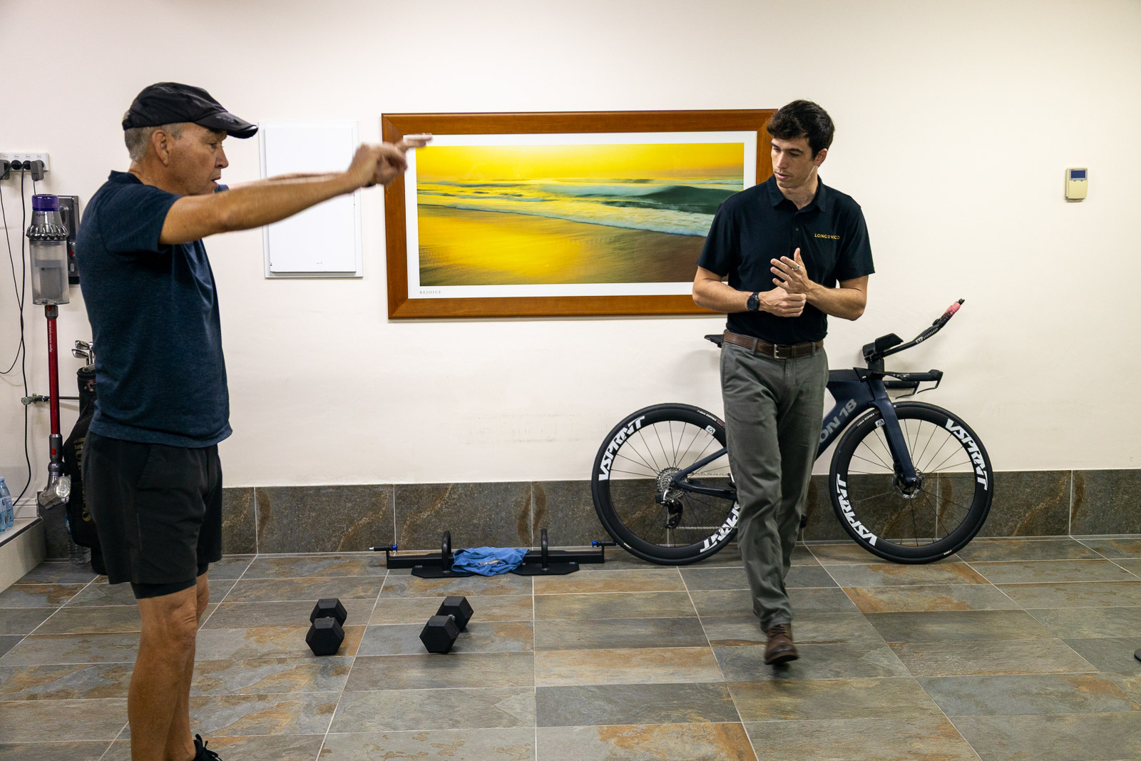 Private health performance consult with an Exercise Physiologist discussing an individual plan.