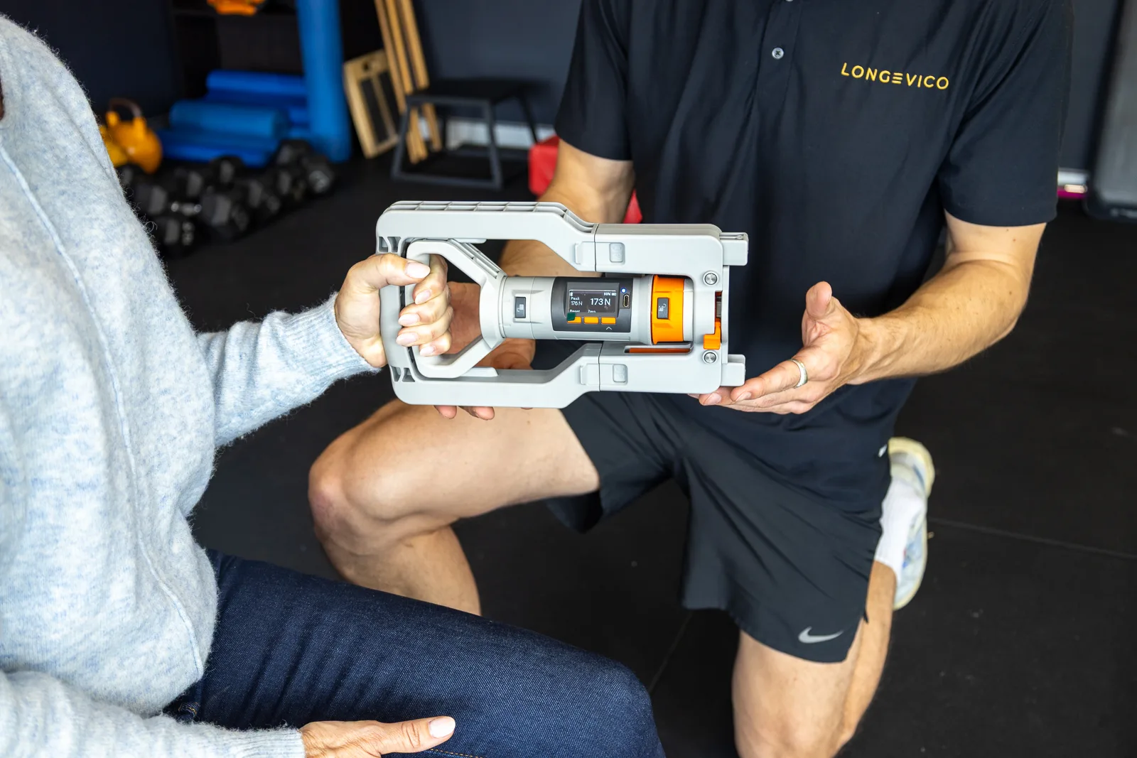 A grip strength assessment in the Longevico studio